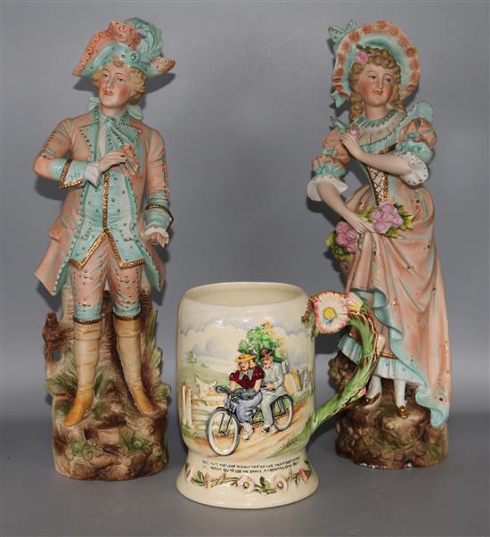A pair of Bisque figures and Crown Devon musical mug